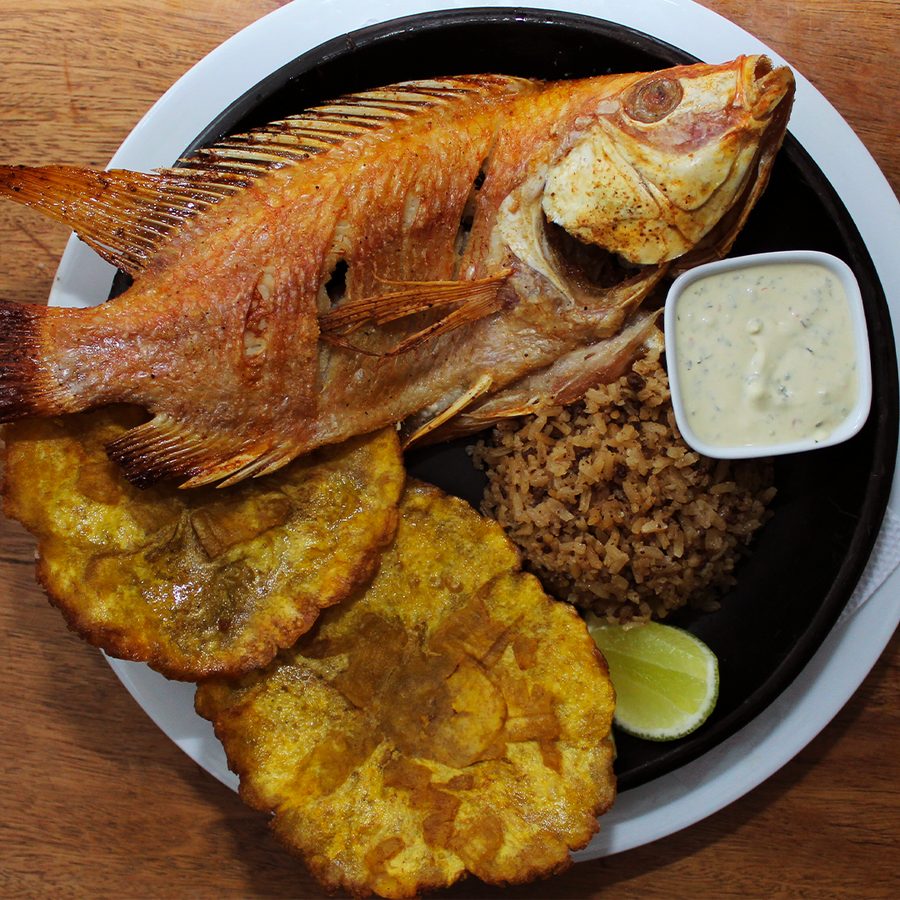 Fried red snapper with shrimp and calamari in lobster sauce