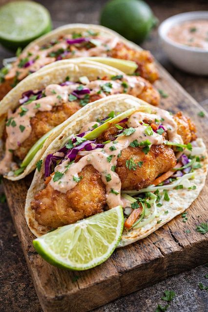 Sea bass tacos with guacamole and chipotle mayo at La Catrina